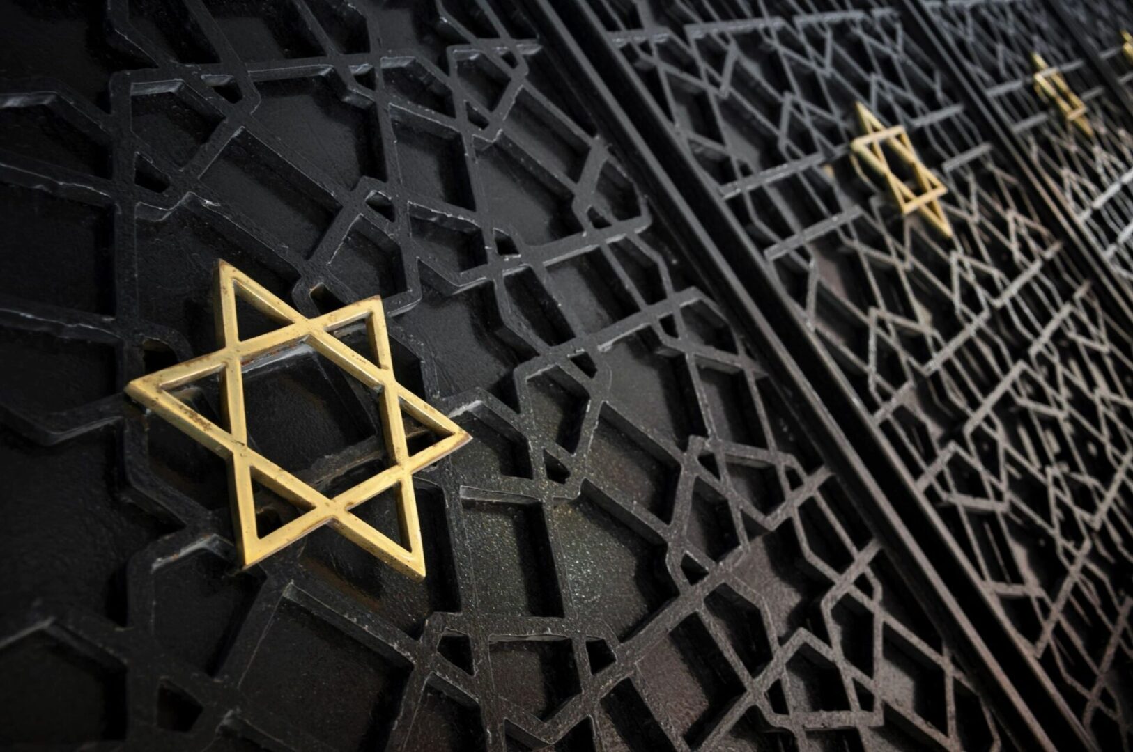 A close up of two star of david decorations